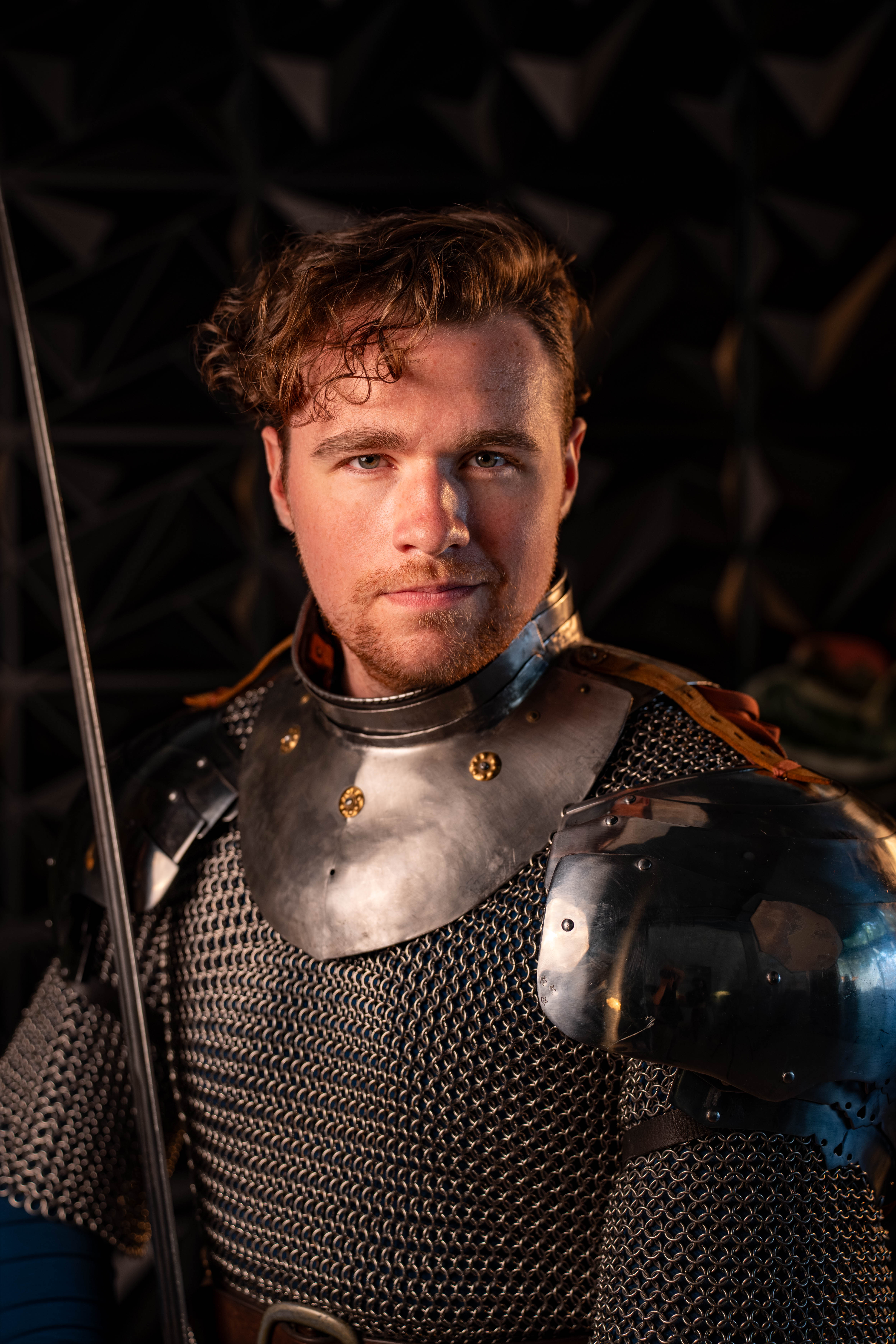 Drew Hearthfire — armored performer portrait