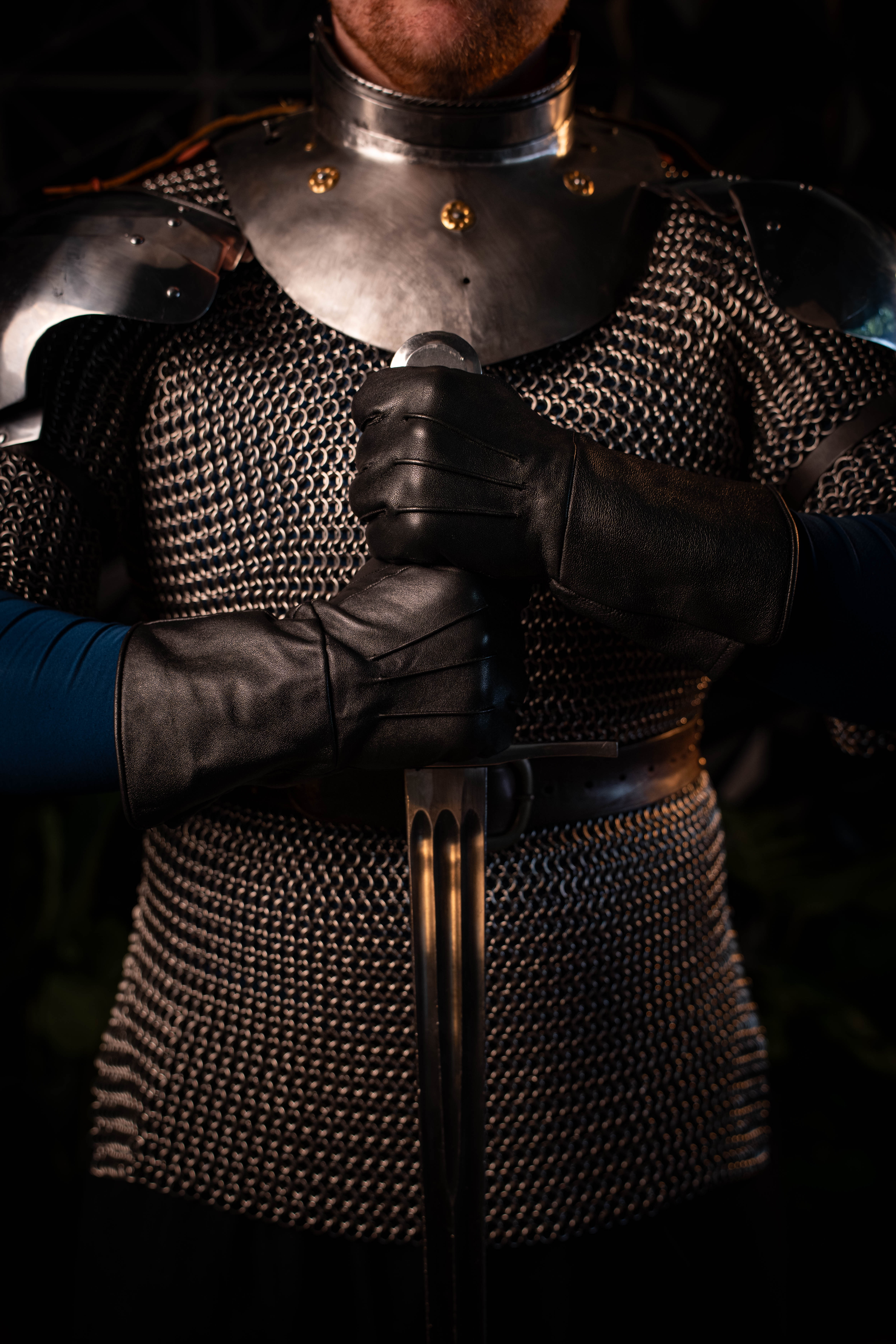 Drew Hearthfire — armored performer portrait
