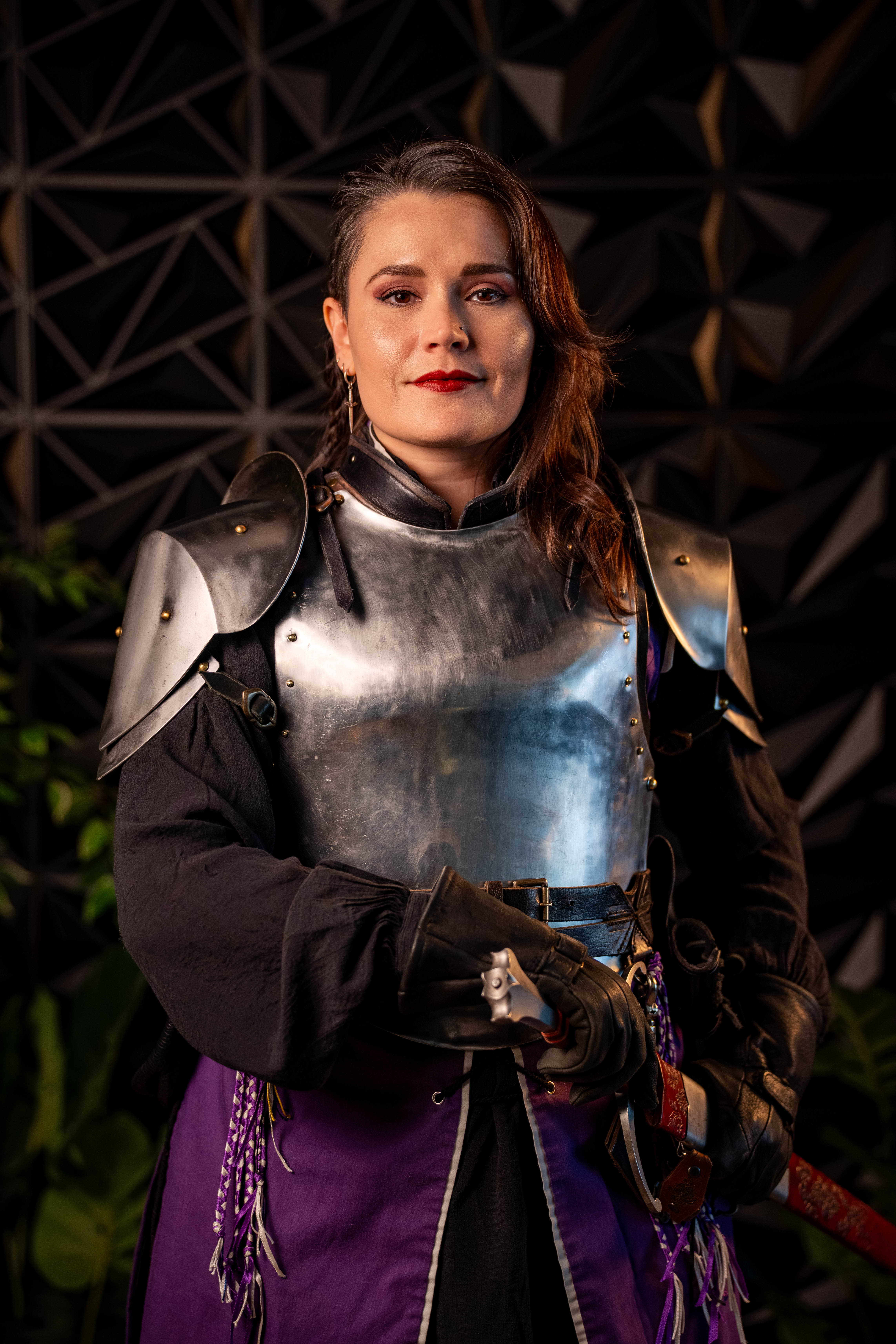 Studio portrait of armored performer